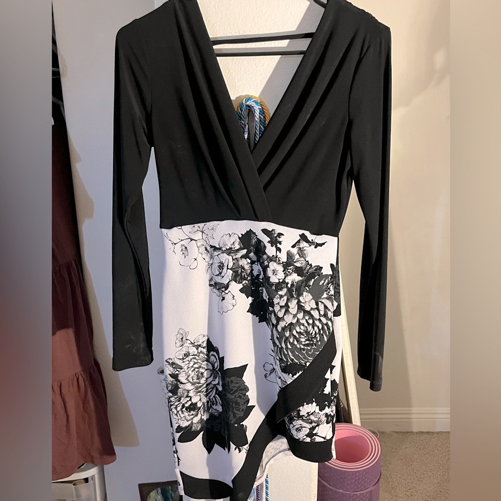 Long sleeve black and white dress with floral skirt
